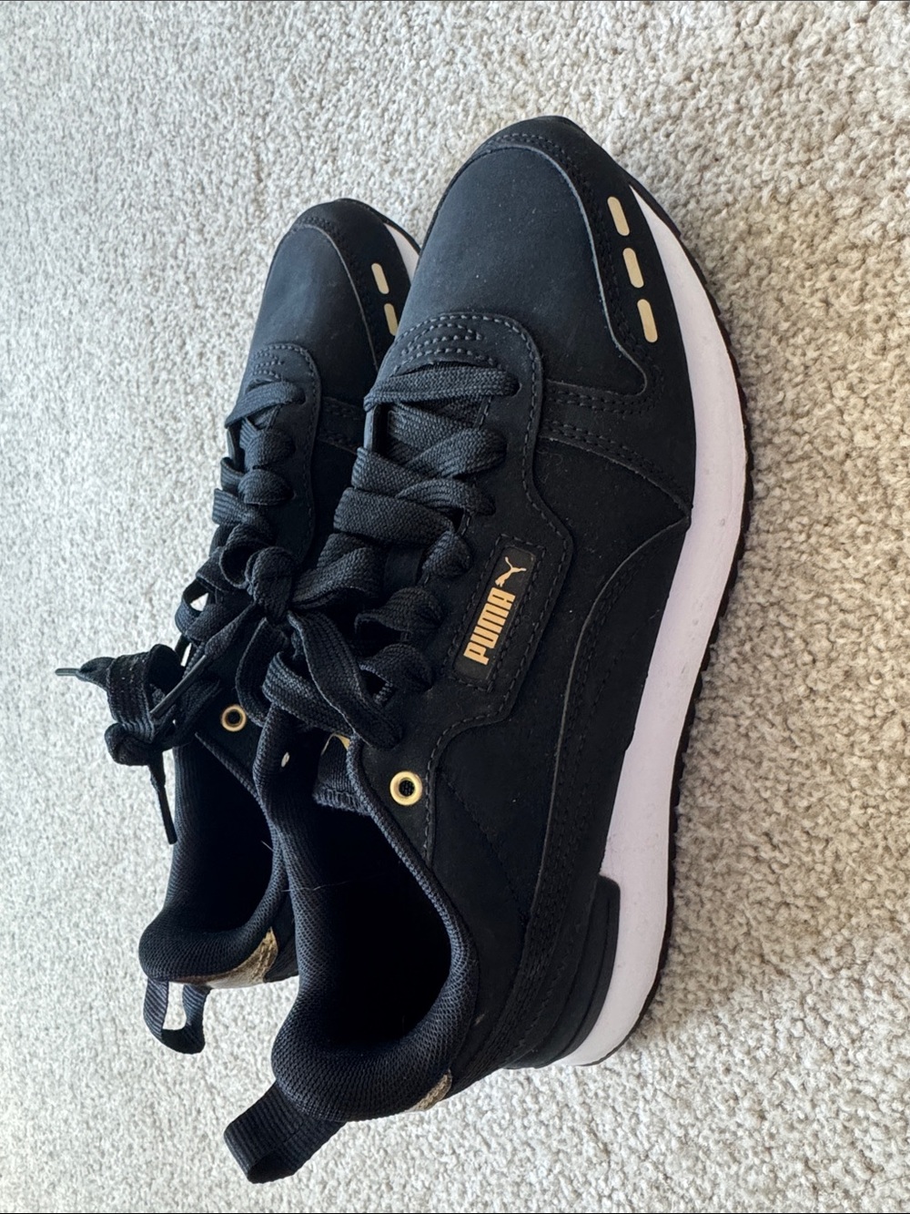 Women’s Puma Black Sneakers with Gold Accents size 8.5